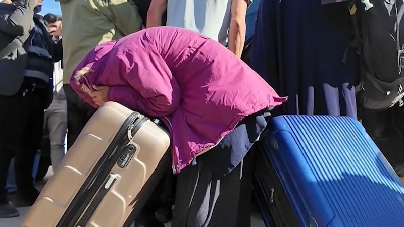 IS women and children leave Syria, two left behind